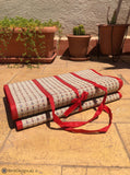 Handwoven Natural Reed Fold up Mat with Red Trim